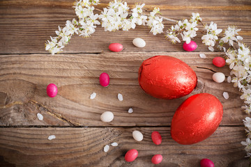 Chocolate Easter Eggs Over Wooden Background