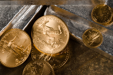 US Gold Eagles on Silver Bars