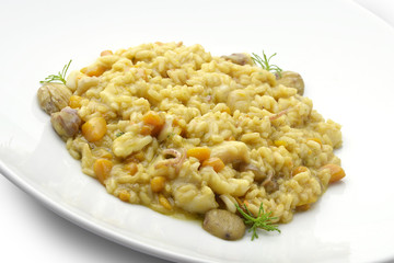 Risotto with sea delicacies pumpkin and chestnuts