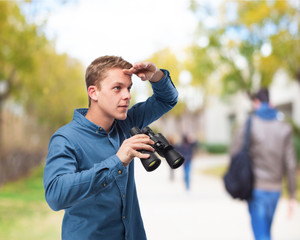 cool young-man with binoculars