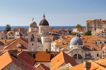 Fototapeta premium Old Town's skyline with red roofs and churches' and cathedrals' towers in Dubrovnik, Croatia.
