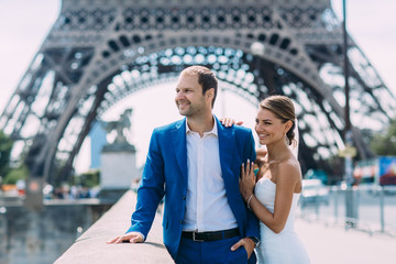 Just married couple near the Eiffel tower in Paris