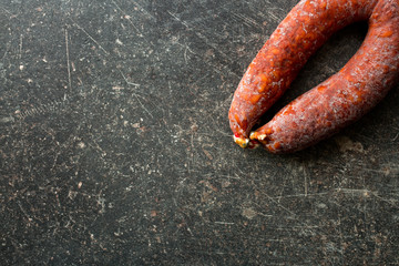 Chorizo sausage on kitchen table