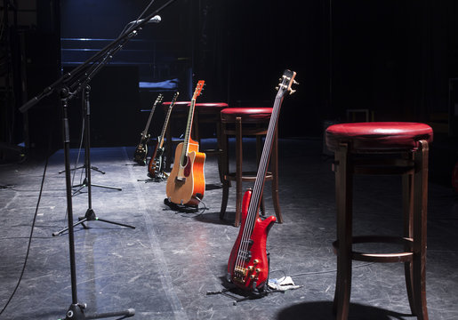 Guitar and other musical equipment on stage before concert