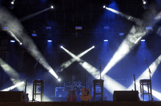 Guitar and other musical equipment on stage before concert