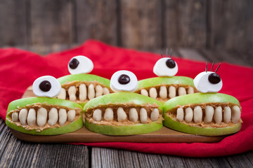 Cute scary halloween apple cyclop monsters food healthy © GreenArt Photography