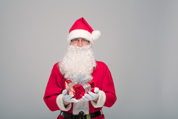 Portrait of happy Santa Claus with a huge sack