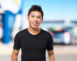 young asian man smiling