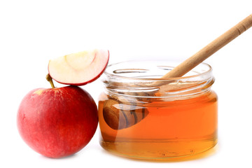 apple and honey isolated on white background