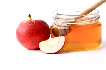 apple and honey isolated on white background
