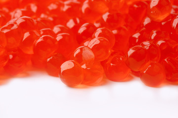 red caviar isolated on white background selective focus delicacy