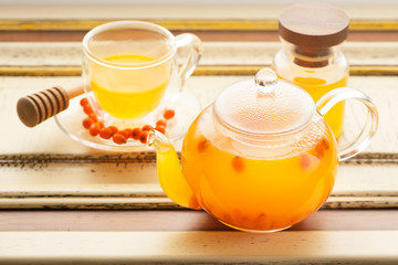Tea with sea-buckthorn berries and honey