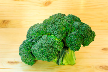 Broccoli on wooden background