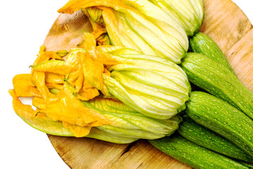 detail of fresh zucchini with flowers