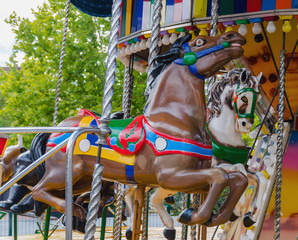 Fototapeta na wymiar two carousel horses
