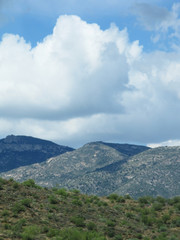 Southwestern landscape with cloud and mountains in Arizona United States in July.