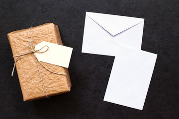 Gift box and envelope with a sheet of paper