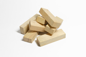 Isolated of pile of wooden blocks on white background