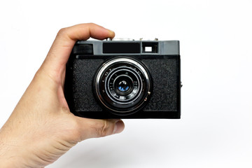 Retro photo camera on a white background