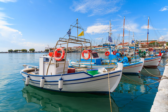 Typical colourful Greek fishing boats in Pythagorion port, Samos island, Greece