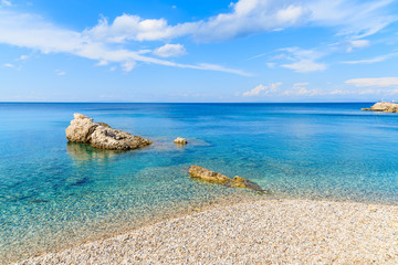 Crystal clear sea water of Kokkari beach, Samos island, Greece