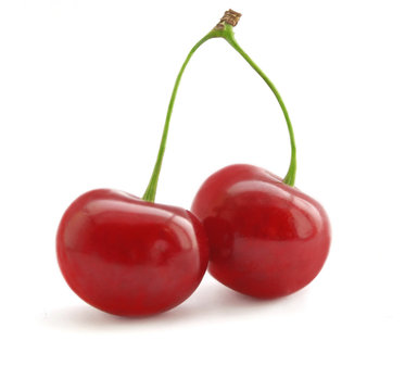 juicy cherries isolated on white