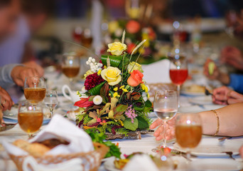 beautiful wedding table with flowers in restaurant