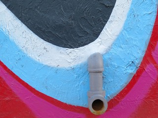 Painted Wall: Colorful Abstract Pattern in Detail of Graffiti      