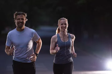 Photo sur Aluminium Jogging couple jogging at early morning
