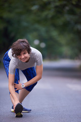 woman  stretching before morning jogging