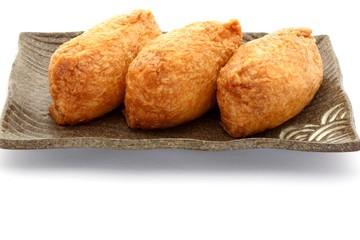 Sushi In Fried Tofu On White Background