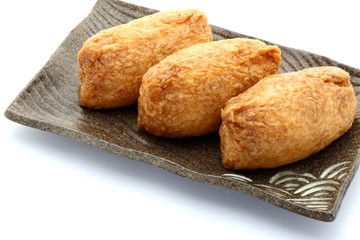 Sushi In Fried Tofu On White Background