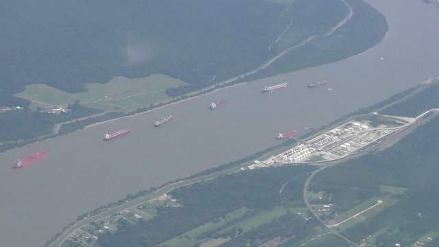 Industrial ships on a river Louisiana USA