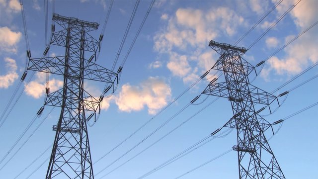 Power lines in silhouette at Grand Coulee Dam, time lapse, 4k ultra hd