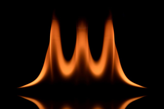 Three fire wave in dark with reflex (Low key)