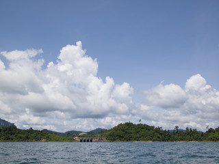 landscape with mountains trees and a lake in front