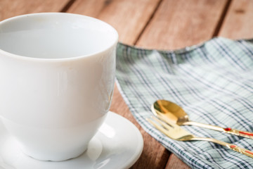 cup of coffee with gold spoon