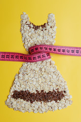 dress shape made from oatmeal with measuring tape