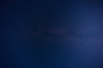 Fototapeta na wymiar Amazing view of night sky full of stars and milky way