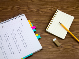 German; Learning New Language Writing Words on the Notebook