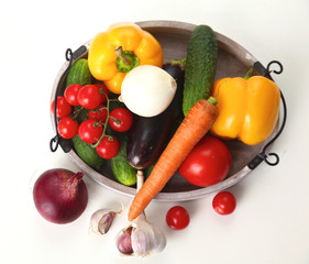 Fresh autumn vegetables on a white background