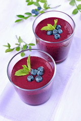 Blueberry smoothie in glasses