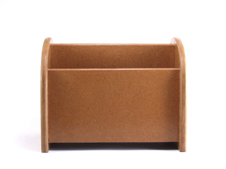 closeup front view of empty wood desk organizer isolated on white