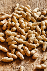 peanuts on wood background