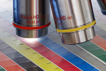 Microscope inspecting colorful test print