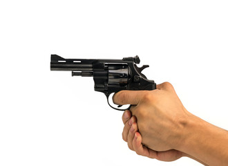 hand holding a gun on a white background