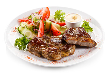 Grilled steaks and vegetables 