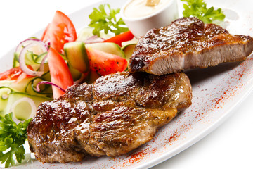 Grilled steaks and vegetables 