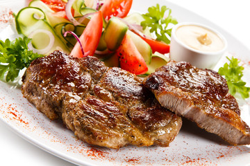 Grilled steaks and vegetables 