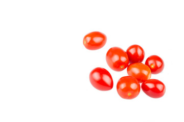 Red cherry tomatoes on white background